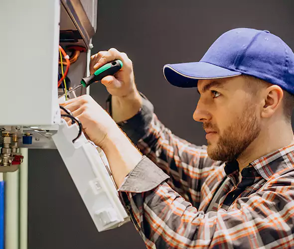 Expert Plumber for Tankless Water Heater Maintenance in Middle Island, NY: Schedule Professional Maintenance Services with Us